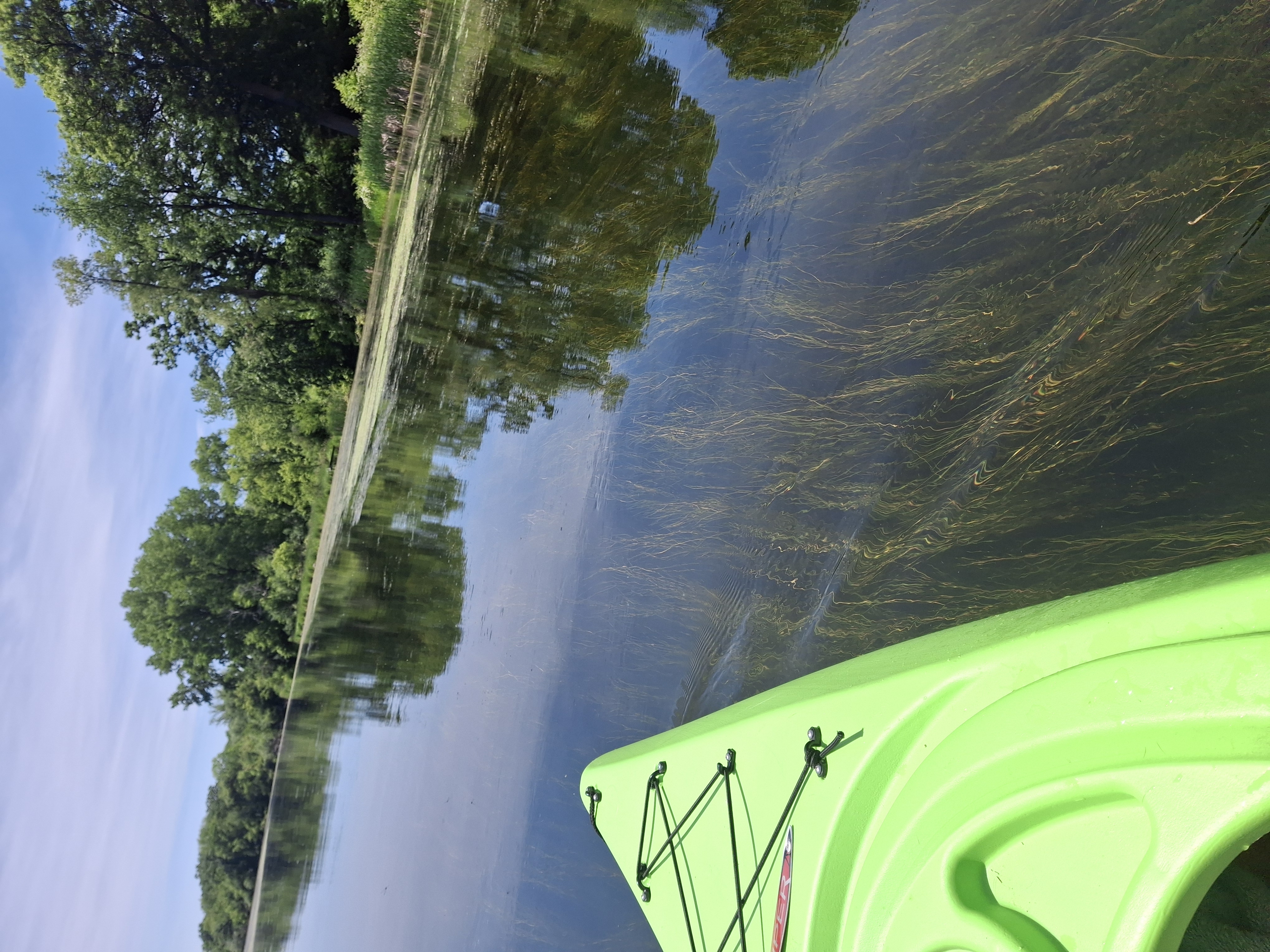 Glassy reflections from the kayak