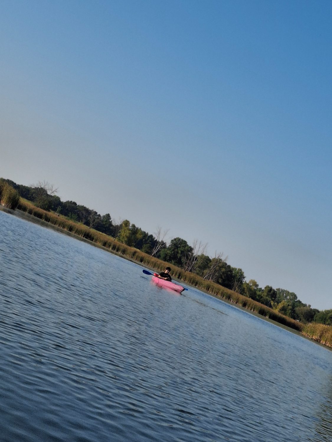 Paddling across Lake Kegonsa